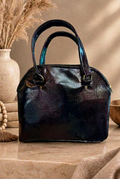 Bag front with targeted dent removal